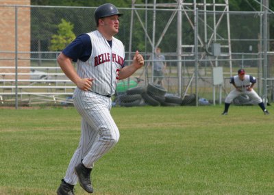 Jeff Tries to Beat out the Throw as Brett Watches Close from 3rd Base