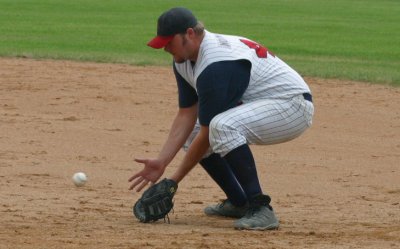 Pat Goes Down For a Grounder